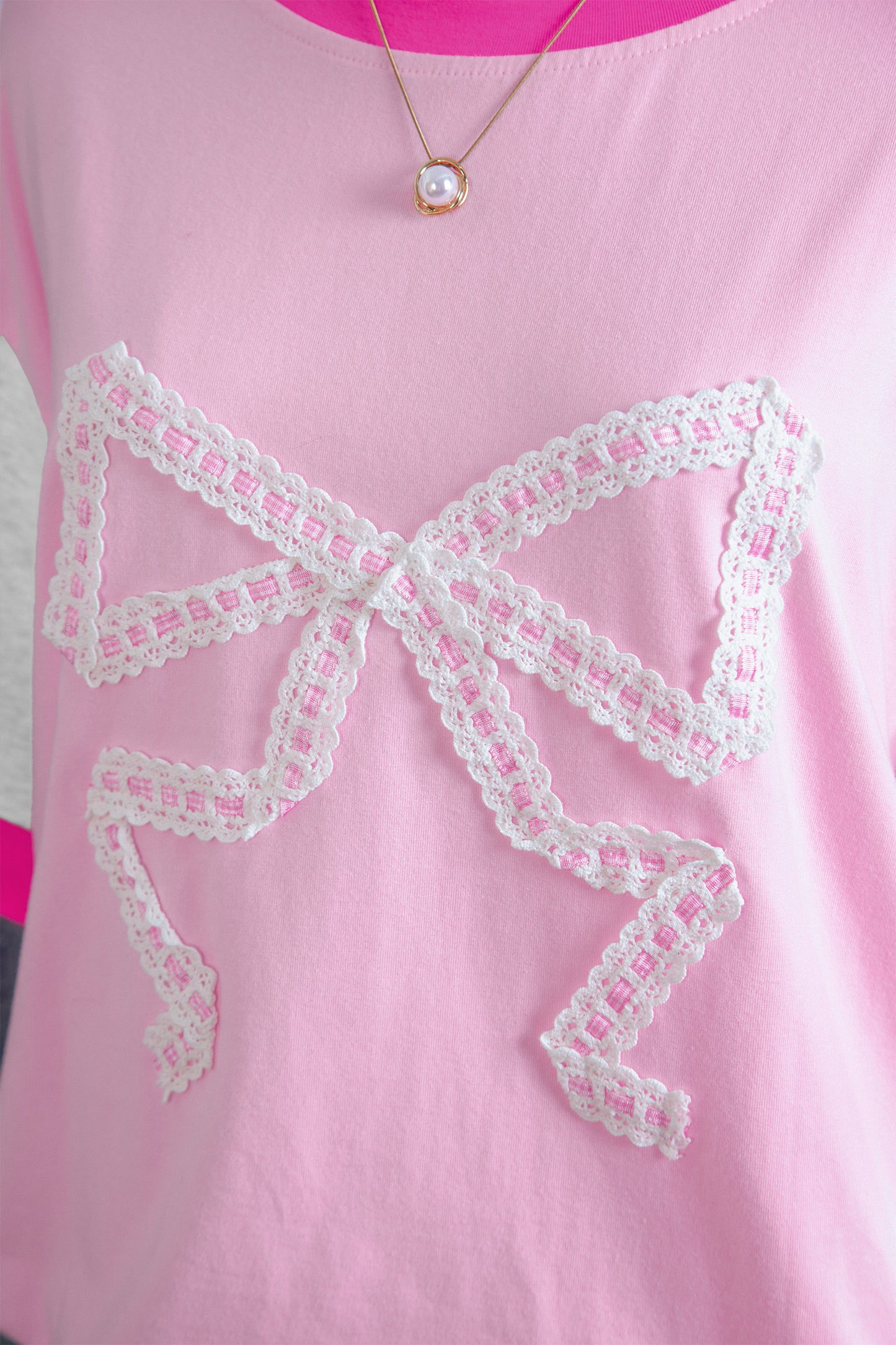 Gossamer Pink Embroidered Bow Detail Color Block Loose Tee